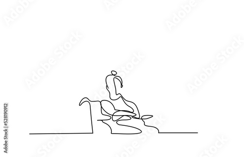 a handicapped woman with uncomfortable feet sits in a wheelchair and poses
