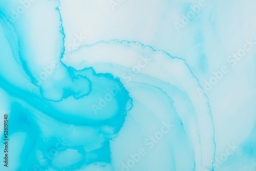 Painting background in a perfect light and blue colors. Liquid, fluid art pattern. Original simulation of the depth of the ocean and the sea surface. Modern design. Drawing by alcohol ink, paints.