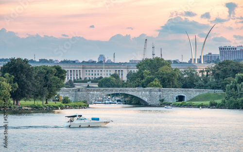 Boat on the Potomac River and Pentagon in the background - Washington, DC (USA)