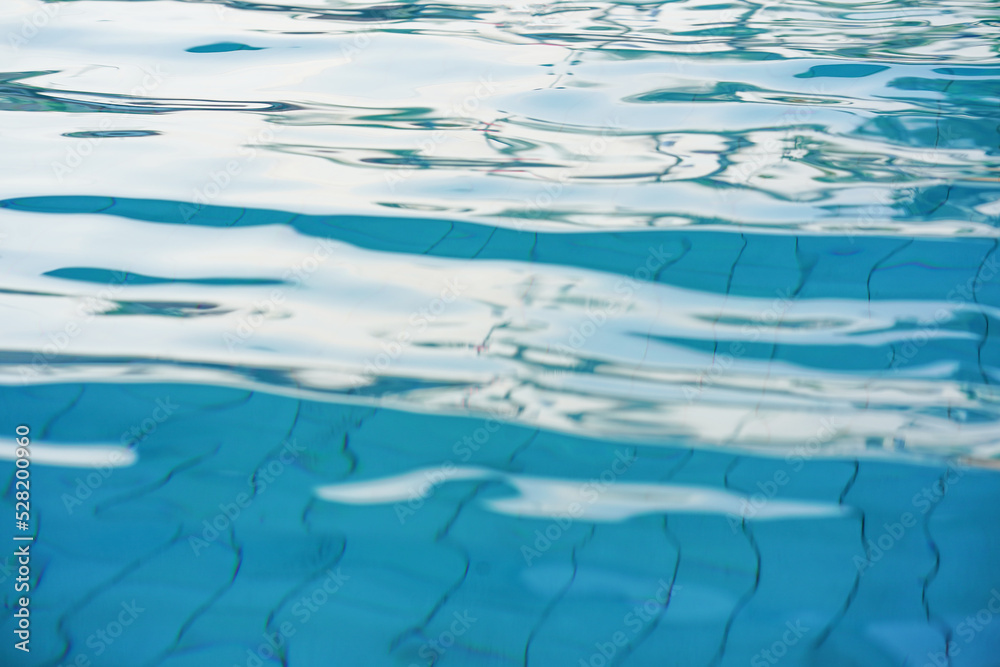 Blue water ripple surface background reflection pattern blur. Abstract blur water surface