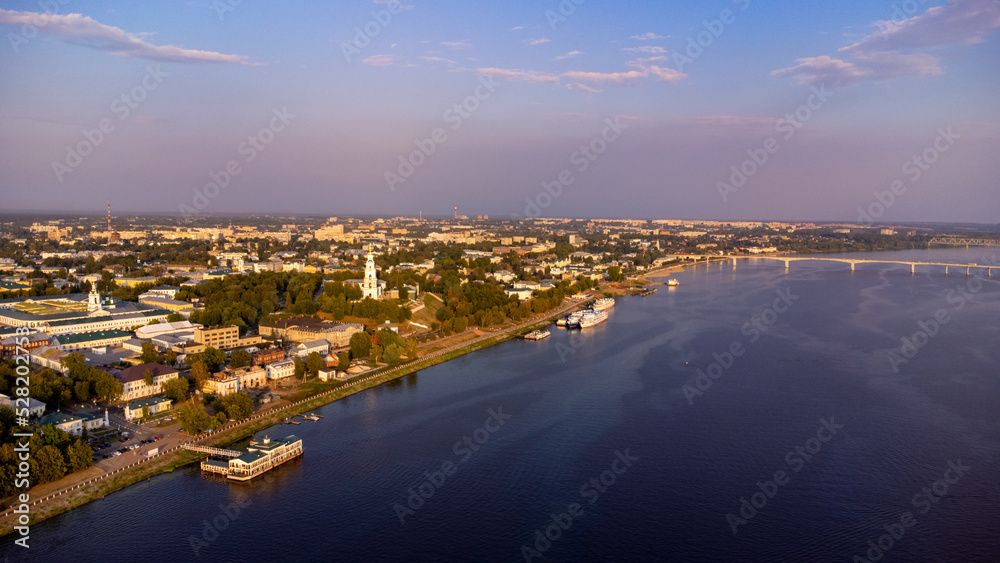 Drone aerial view of the historical center of Kostroma, Russia, with and Volga river at sunset. travel background