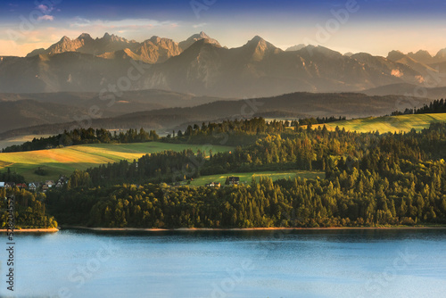 A view from Pieniny to the Czorsztyn Lake and the Tatra Mountains. Summer, Poland. Widok z Pienin na jezioro czorsztyńskie i Tatry. Góry, Polska. Przełęcz Snozka
