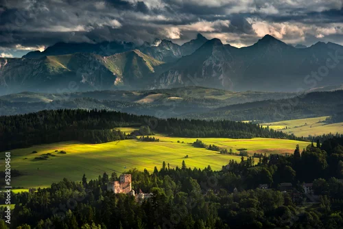 Obraz View from Pieniny at the Dunajec Castle in Niedzica and the Tatra Mountains. Summer, Poland. Widok z pienin na Zamek Dunajec w Niedzicy i tatry. Lato, Polska.
