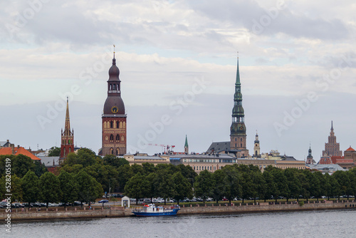 View of the city of Riga, church towers and roofs of houses can be seen in the old town. A view of Riga across the river Daugava