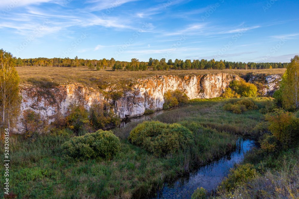 Ustinovsky limestones. It is located in the valley of the Miass river near Ustinovo village. South Ural, Chelyabinsk region, Russia.