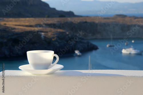 Sea and morning cup of coffee, Lindos, Greece.