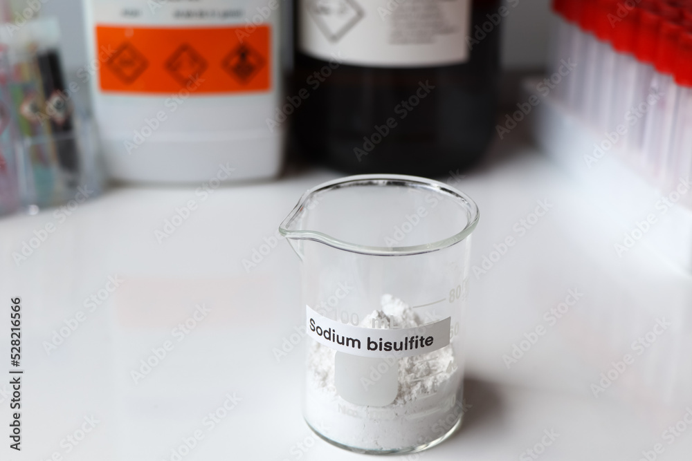 sodium bisulfite powder in glass, chemical in the laboratory sodium bisulfite powder in glass, chemical in the laboratory