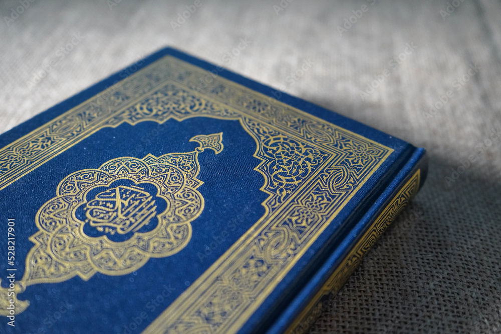 Fototapeta premium The Quran, also romanized Qur'an or Koran, is the central religious text of Islam, believed by Muslims to be a revelation from God (Allah).It is widely regarded as the finest work in classical Arabic