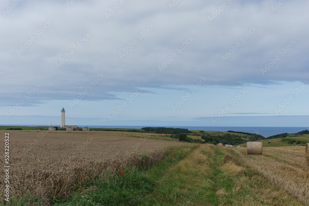 Lighthouse Phare d'Antifer with fields on the Alabaster Coast near Etretat, Normandy, France