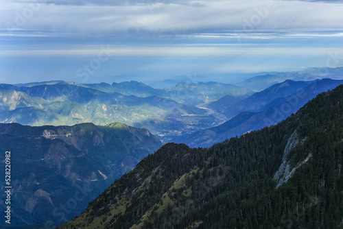 Fototapeta Naklejka Na Ścianę i Meble -  Landscape View of Yushan Main Peak And Tongpu Valley From the North Peak of Jade Mountain At Sunrise, Yushan National  Park, Chiayi , Taiwan