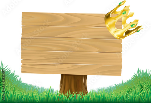 Golden crown hanging on sign