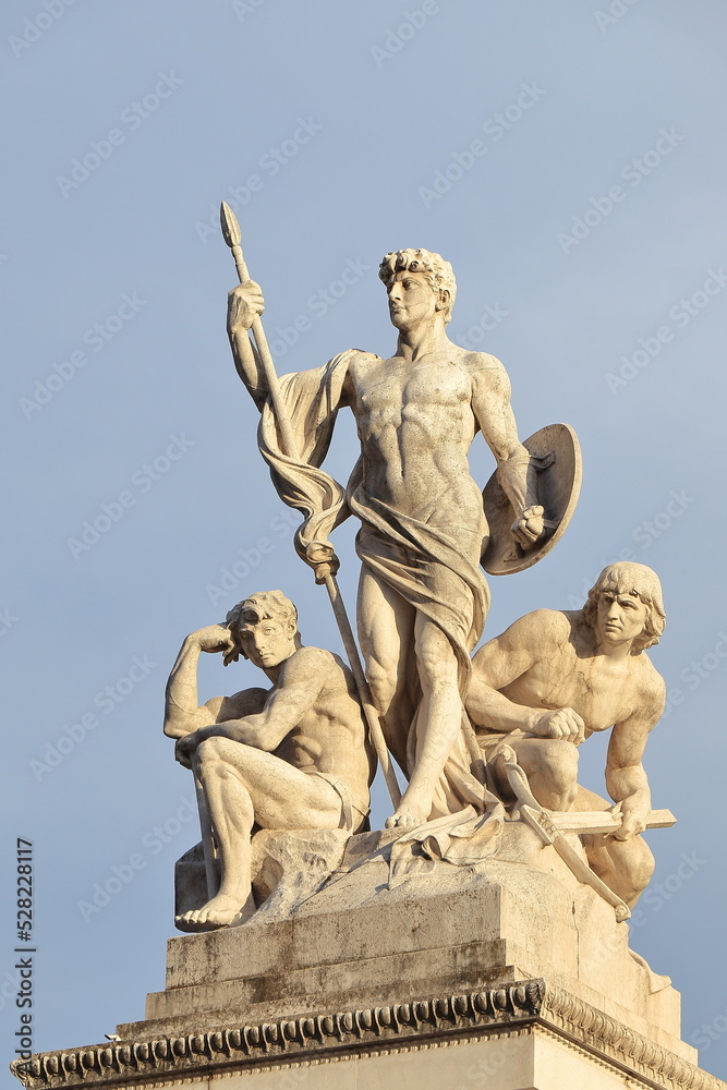 Sculpture of a Group of Three Men Symbolizing Strength at the Vittoriano National Monument in Rome, Italy
