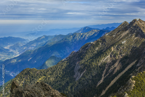 Landscape View Yushan Mountains On The Top Of Yushan With A Sign of "Mt. Jade Main Peak" On The Stone, Yushan National Park, Chiayi, Taiwan