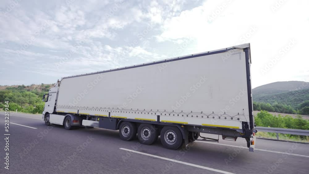 A truck on the highway. Logistics.
The transport truck is driving on the highway.
A truck on the highway. Logistics.
The transport truck is driving on the highway.