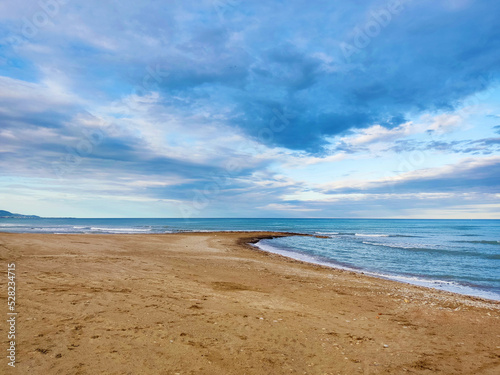 Sea shore beach. Blue wave and cloud on landscape. Beautiful coastline on summer vacation.