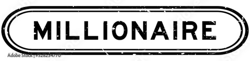 Grunge black millionaire word rubber seal stamp on white background