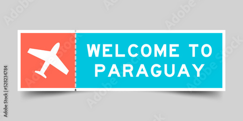 Orange and blue color ticket with plane icon and word welcome to paraguay on gray background