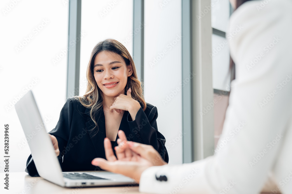 Business partners having meeting in coworking office space Business partners having meeting in coworking office space