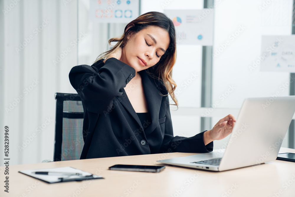 Successful asian businesswoman working and looking camera at her office desk, Concept of business risk analysis and assessment Successful asian businesswoman working and looking camera at her office desk, Concept of business risk analysis and assessment