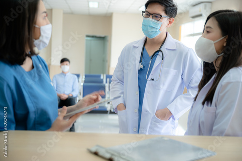 Wallpaper Mural professional doctor and medicine person team have a conversation to talking in hospital about medical health care work, wearing surgical face mask Torontodigital.ca