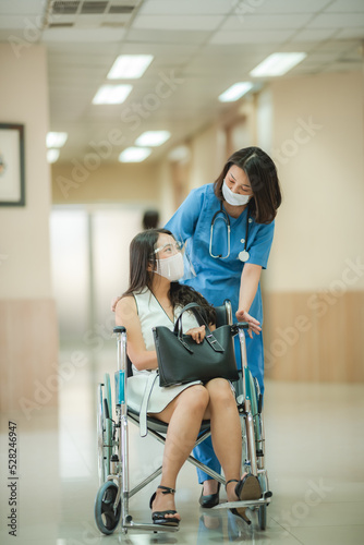 Smiling young female doctor...
