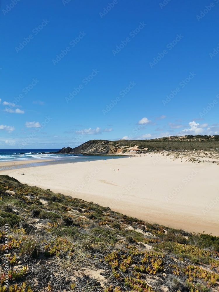 a wide beach on the west coast of Portugal