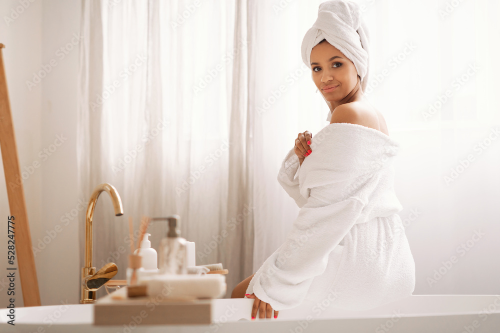 Pretty Lady Posing Wearing Bathrobe Sitting In Modern Bathroom Pretty Lady Posing Wearing Bathrobe Sitting In Modern Bathroom