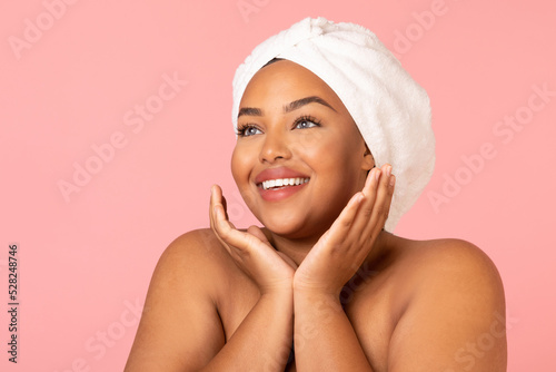 Portrait Of Overweight Black Woman Posing Looking Aside, Pink Background
