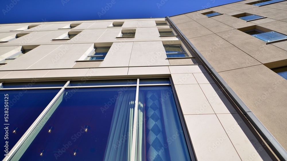 Obraz premium Modern residential building on a sunny day. Apartment house.