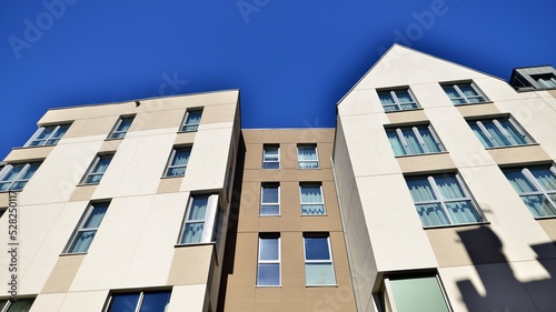 Modern residential building on a sunny day. Apartment house.