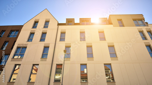 Modern residential building on a sunny day. Apartment house.
