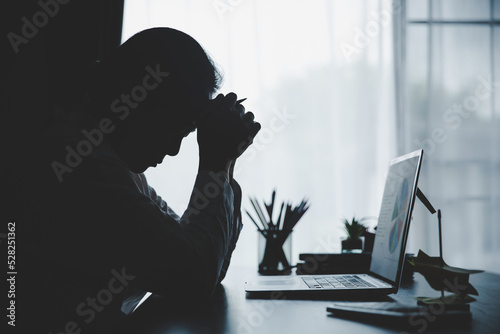 Stress business woman person from hard work, depression in office. Tired and anxious employee female with unhappy at problem job. young businesswoman sitting sad front of laptop computer on desk.