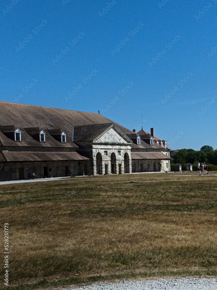Arc-et-Senans, France 2022: Visit the magnificent Royal Saltworks built in the 18th century by the royal architect Claude-Nicolas LEDOUX. Arc-et-Senans, France 2022: Visit the magnificent Royal Saltworks built in the 18th century by the royal architect Claude-Nicolas LEDOUX.