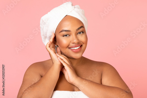 Black Plus Size Female Holding Hands Near Face, Pink Background