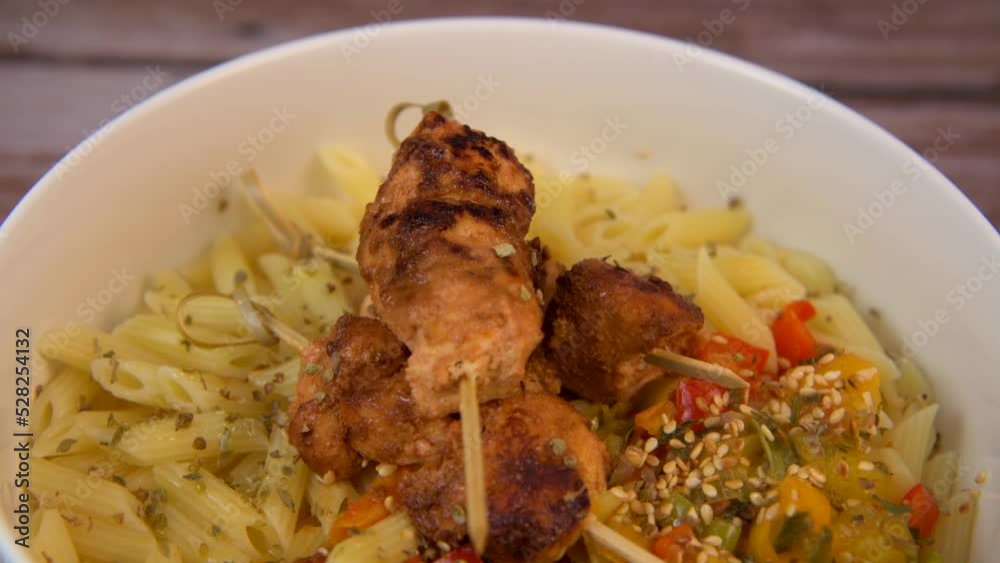 Recipe for chicken shish taouk brochettes with pasta and vegetables. High quality video Recipe for chicken shish taouk brochettes with pasta and vegetables. High quality video