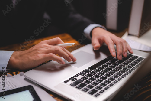 business person hands typing on computer keyboard closeup banner  businessman or student using laptop at home  online learning  internet marketing  working from home  office workplace freelance