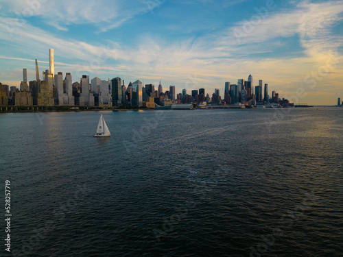 city skyline with boat new york city