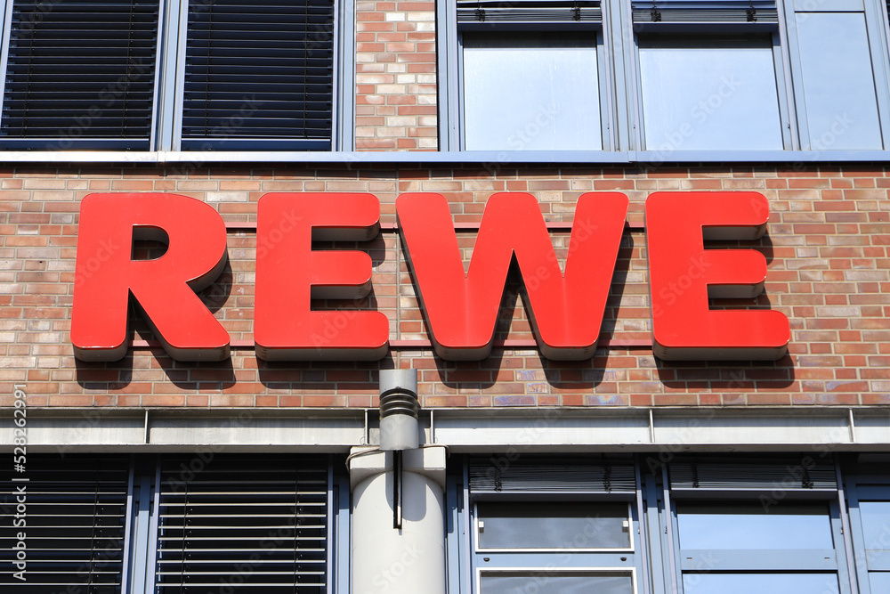 Rewe supermarket logo - a German supermarket chain with stores across