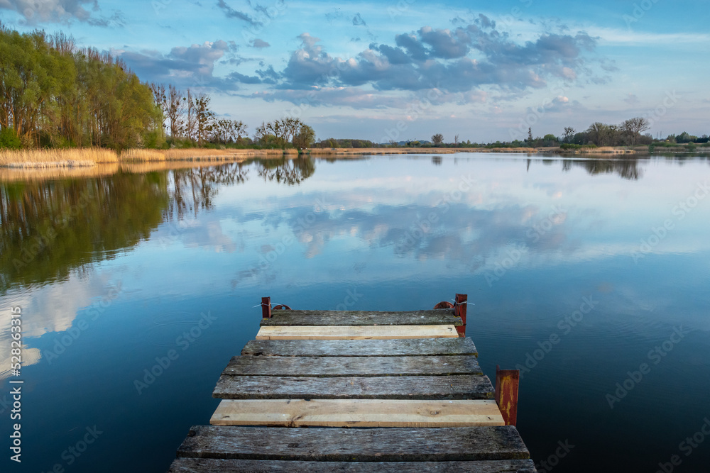 Wooden pier jutting out into the lake