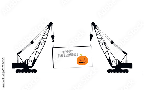 The cargo is held by two self-propelled construction cranes. Happy halloween, celebration concept.