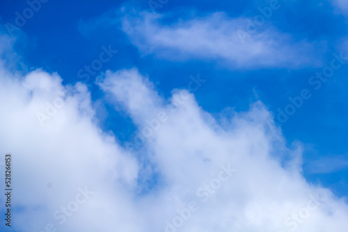 Summer blue sky clouds on light gradient white background. Cloudy sunny beauty in calm sunshine bright winter air background. 