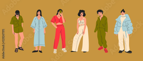 Set of young women dressed in stylish trendy clothes. Fashion look. Female models standing in various poses. Different clothing. Cartoon style. Fashionable ladies. Hand drawn Vector illustration