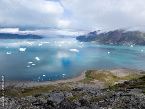 Breathtaking lansdcapes at the edge of the plateau near Igaliku, Southern Greenland. A vigorous with outstanding views of the Qooroq Ice Fjord photo