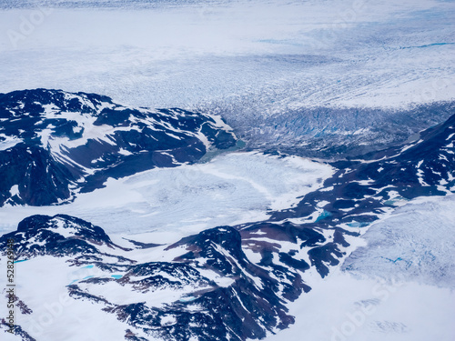 View of the glaciars stemming from the gigantic Greenlandic ice cap, Narsarsuaq, Greenland photo