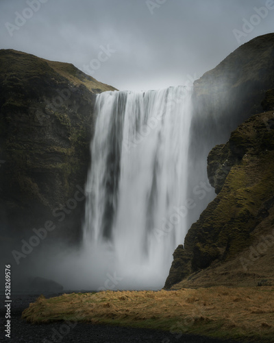 Atmospheric view of iconic Skogafoss waterfall on Skoga river. Southern Iceland  Europe. 