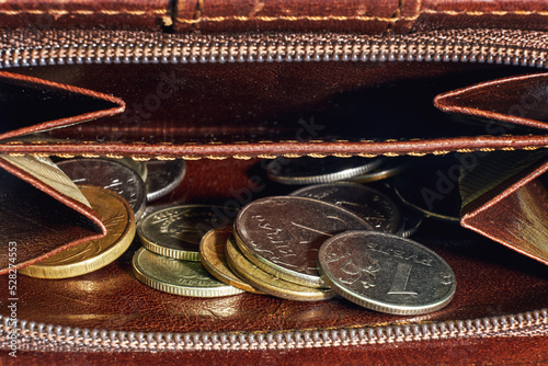 Russian money in a wallet close-up, coins rubles and kopecks from Russia