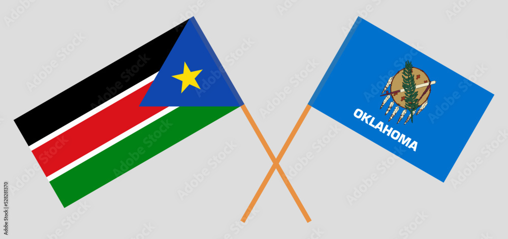 Crossed flags of South Sudan and The State of Oklahoma. Official colors. Correct proportion Crossed flags of South Sudan and The State of Oklahoma. Official colors. Correct proportion