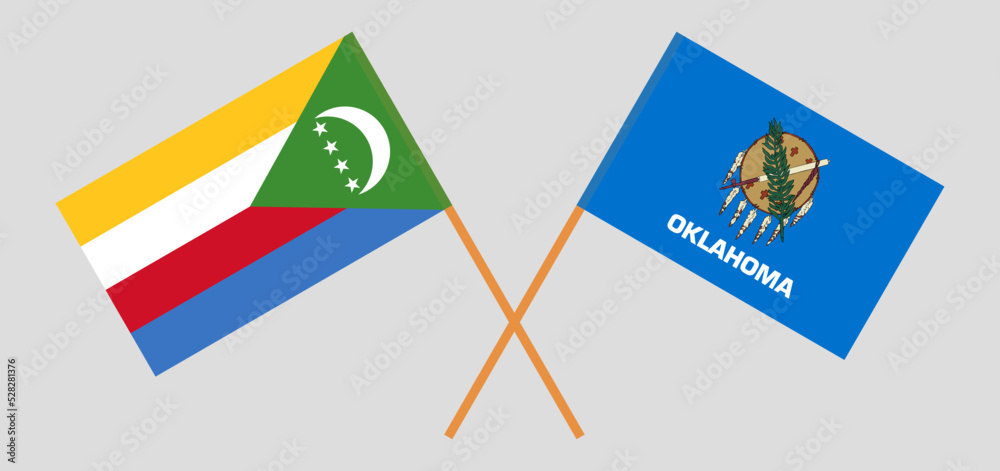 Crossed flags of The State of Oklahoma and the Comoros. Official colors. Correct proportion Crossed flags of The State of Oklahoma and the Comoros. Official colors. Correct proportion