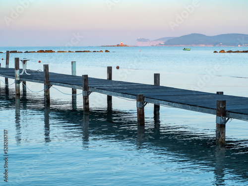 Alghero beach dock in the morning  Italy