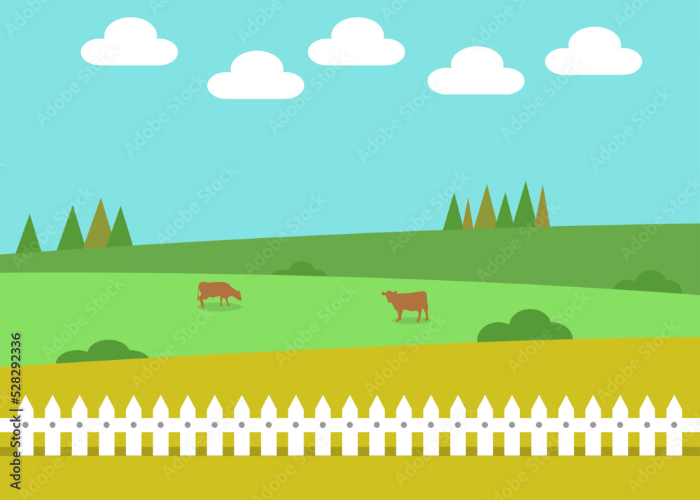 Braune Kühe auf einer grüner Wiese im Hintergrund mit einem weißen Zaun im Vordergrund.